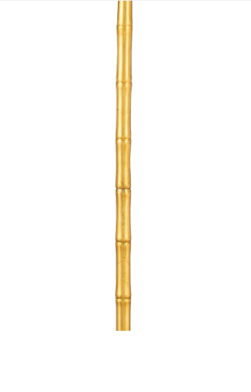 Gold lamp with white background.