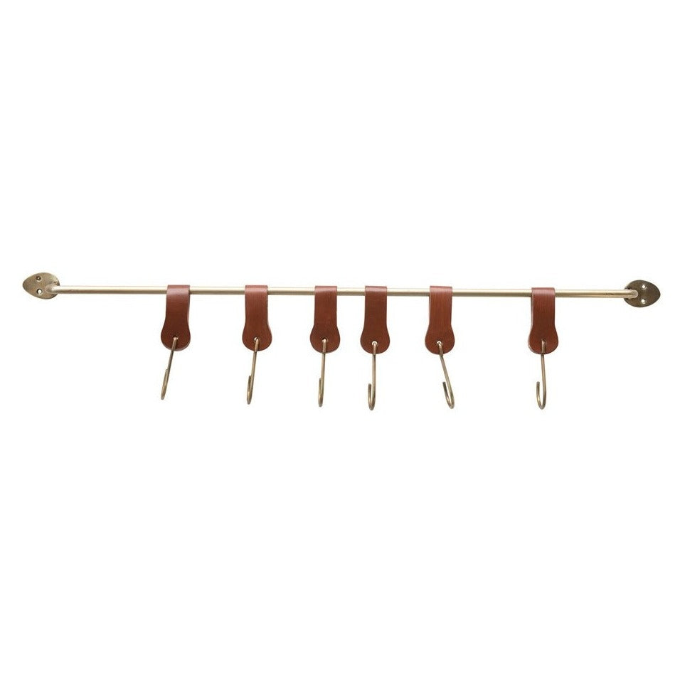 brass rod with leather hooks  on white background. 