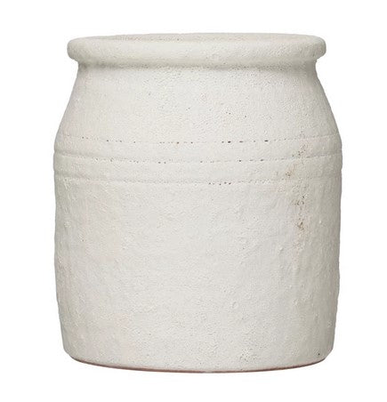 distressed coarse terracotta crock on white background